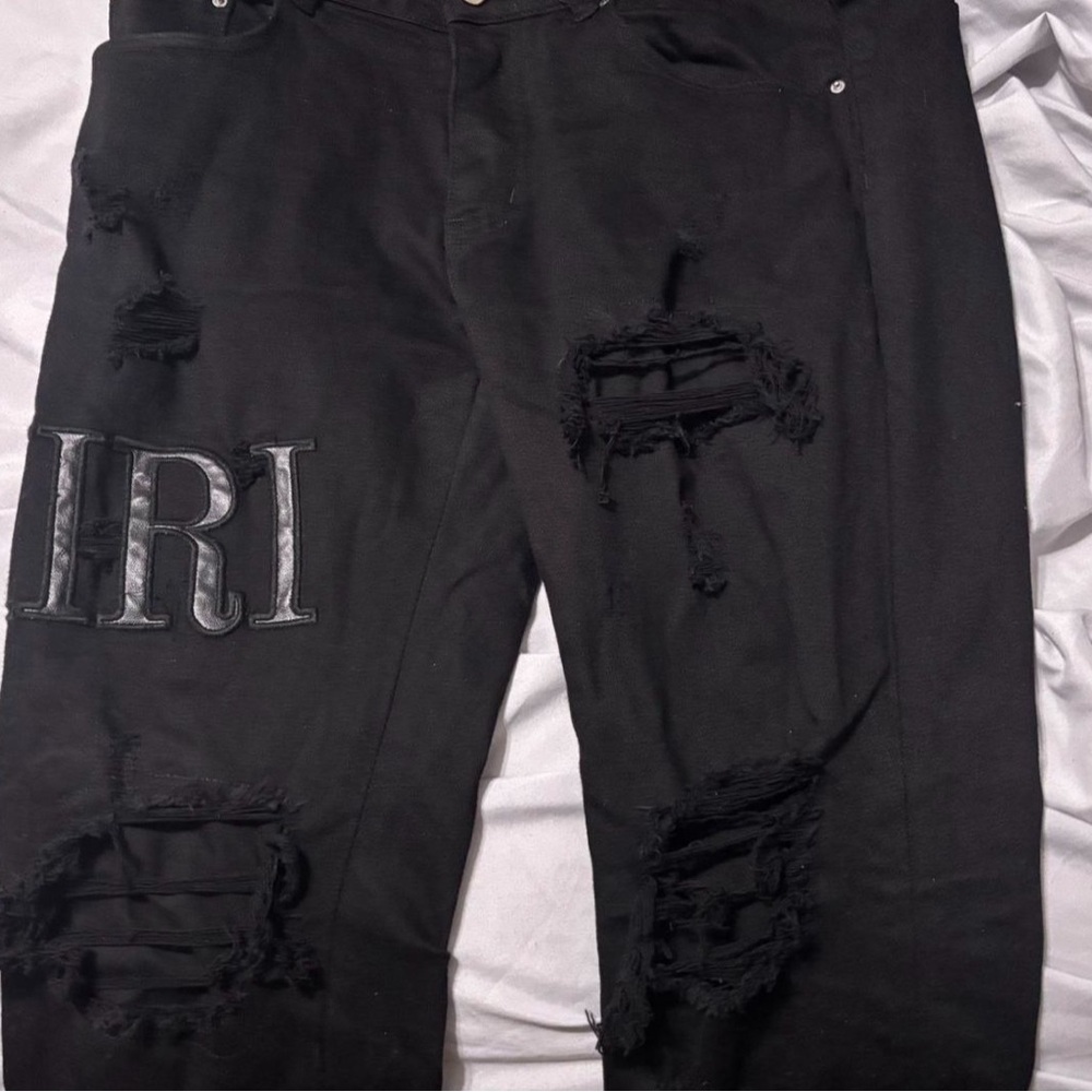 AMIRI Black Distressed Skinny Jeans